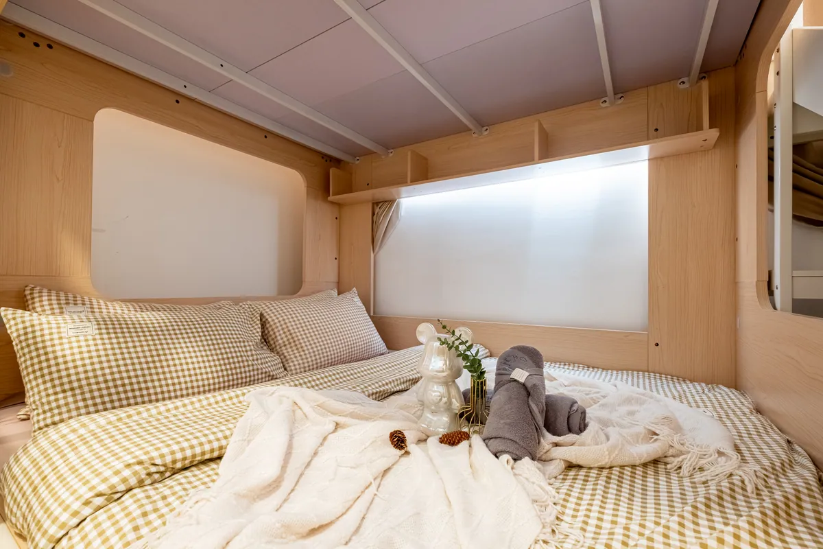 The lower bunk, a queen bed inside the bunk house